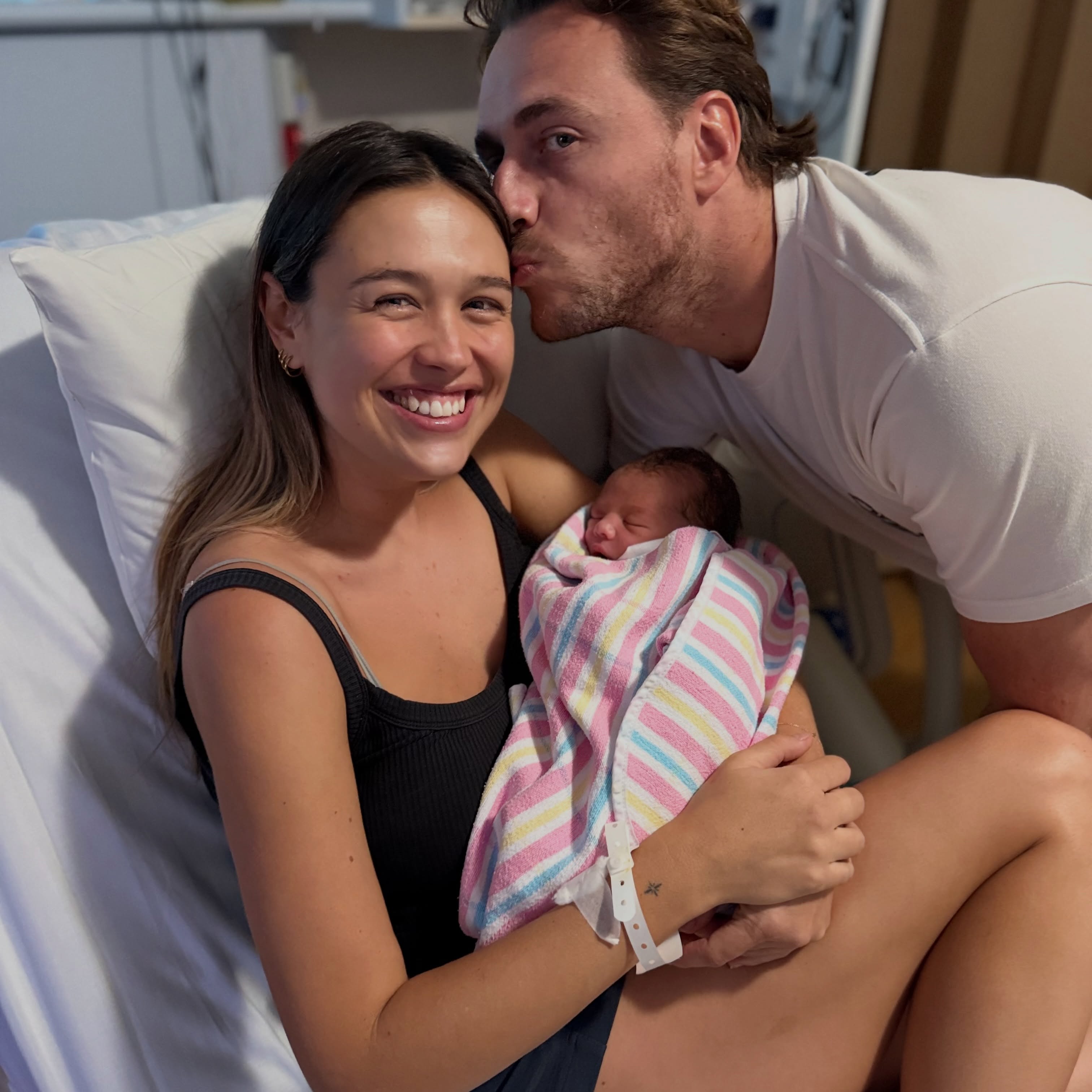 Phoebe and Theo with newborn Louis