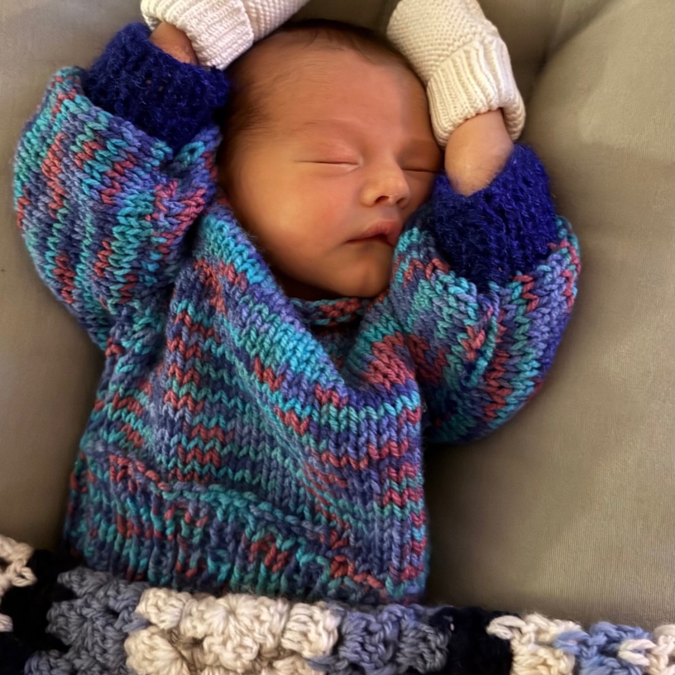Louis in a hand-knitted jumper